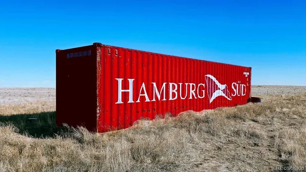 a sign board with red sign board