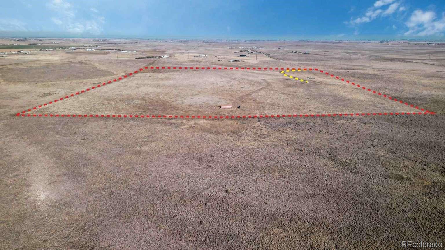 3900 County Road L Wiggins, CO 80654 - Photo 8 of 35 a view of beach and small yard