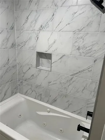 a bathroom with a bathtub