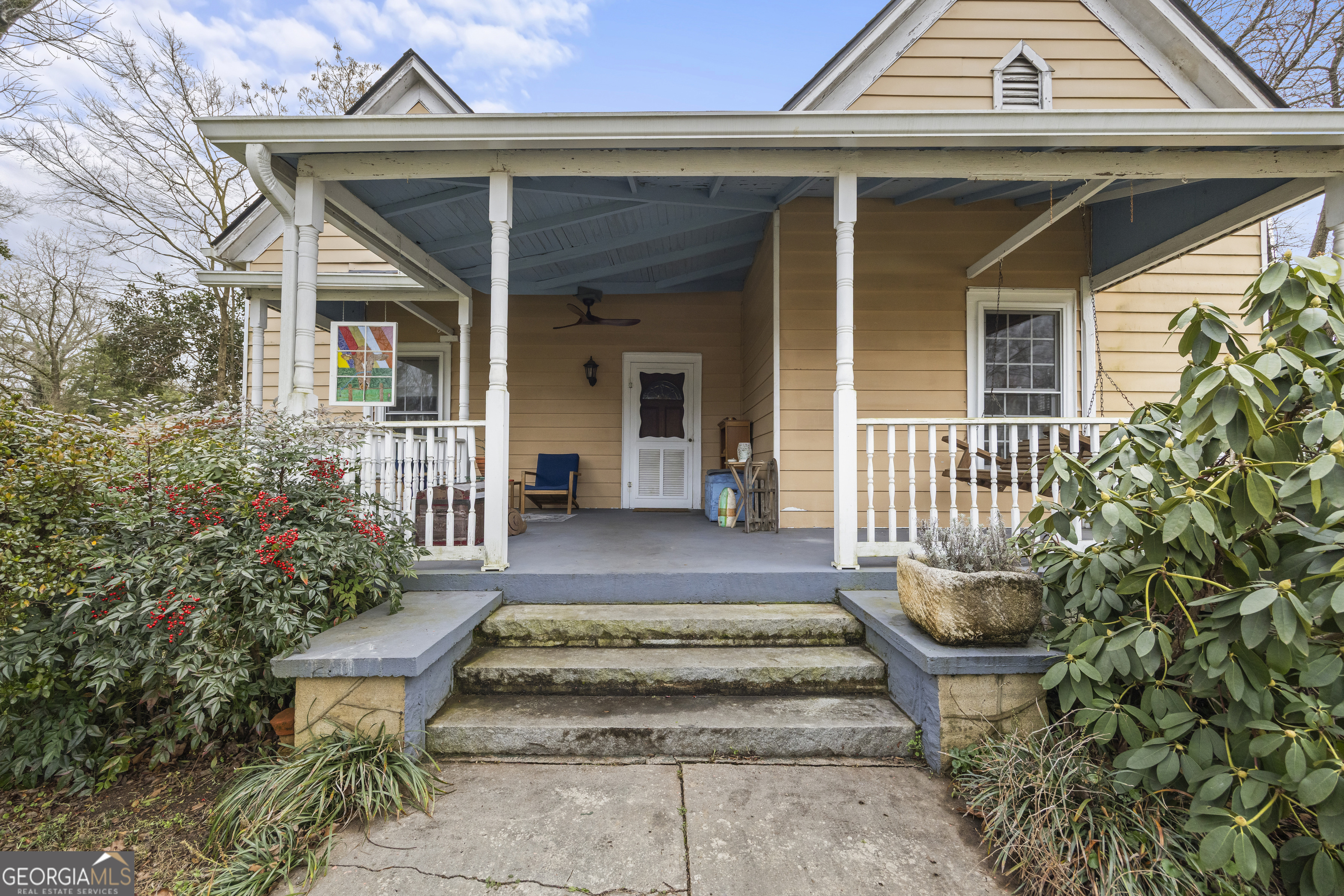 48 Georgia Avenue Comer, GA 30629 - Photo 11 of 46 a view of a house with potted plants