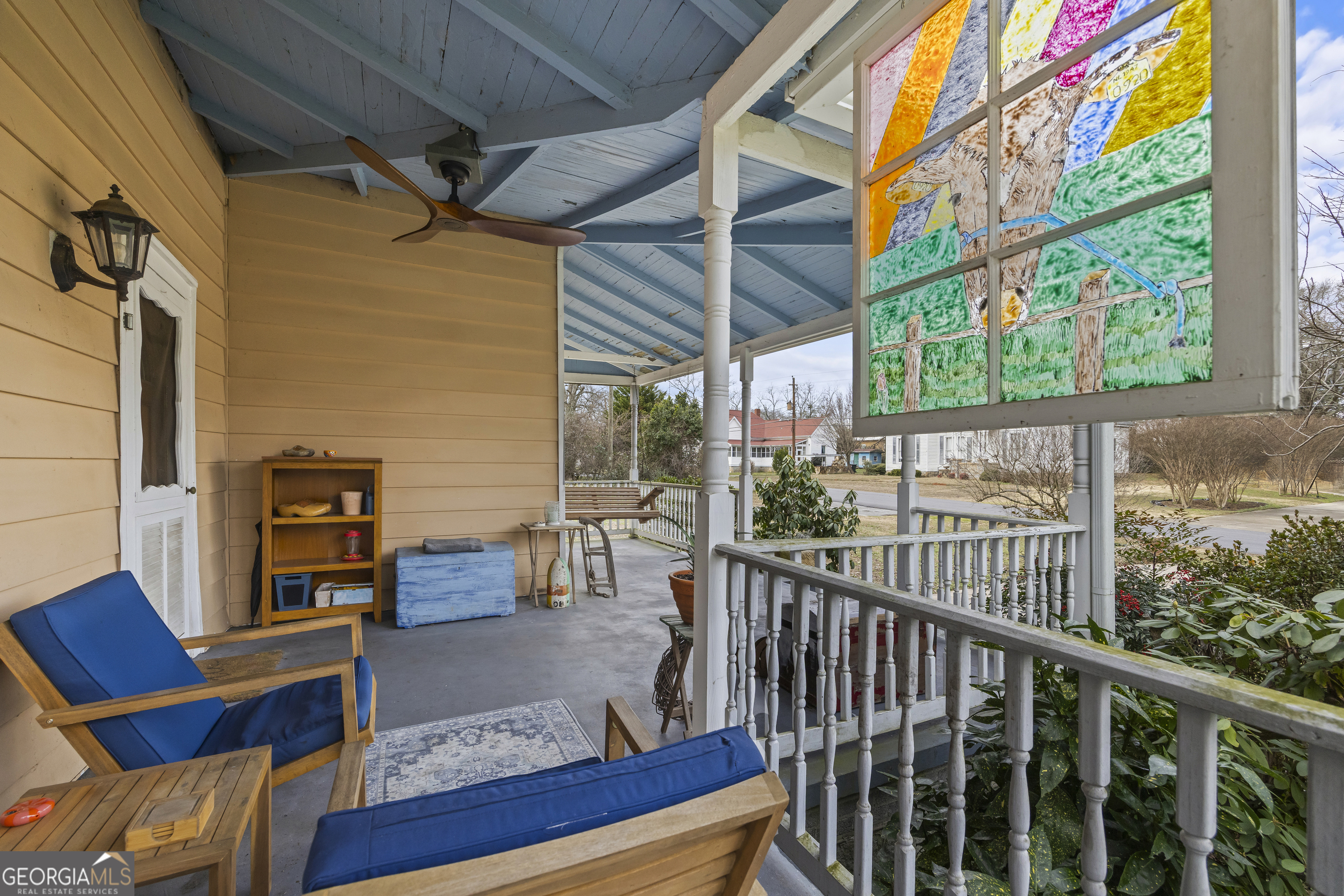 48 Georgia Avenue Comer, GA 30629 - Photo 13 of 46 a view of a chairs and table in the balcony