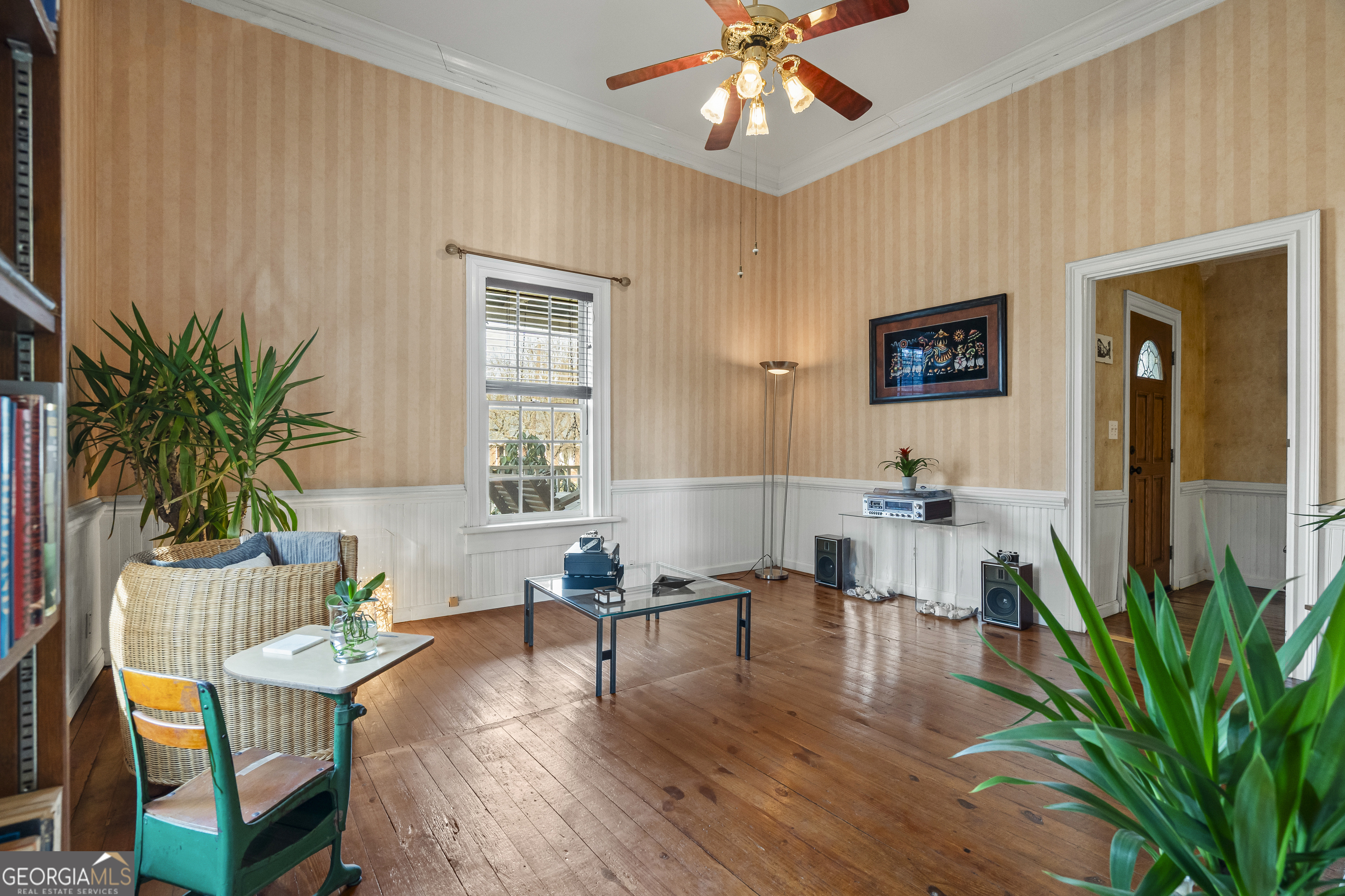 48 Georgia Avenue Comer, GA 30629 - Photo 19 of 46 a living room with furniture potted plant and a window