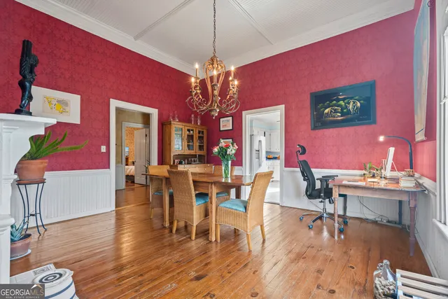a view of a livingroom with furniture and a window