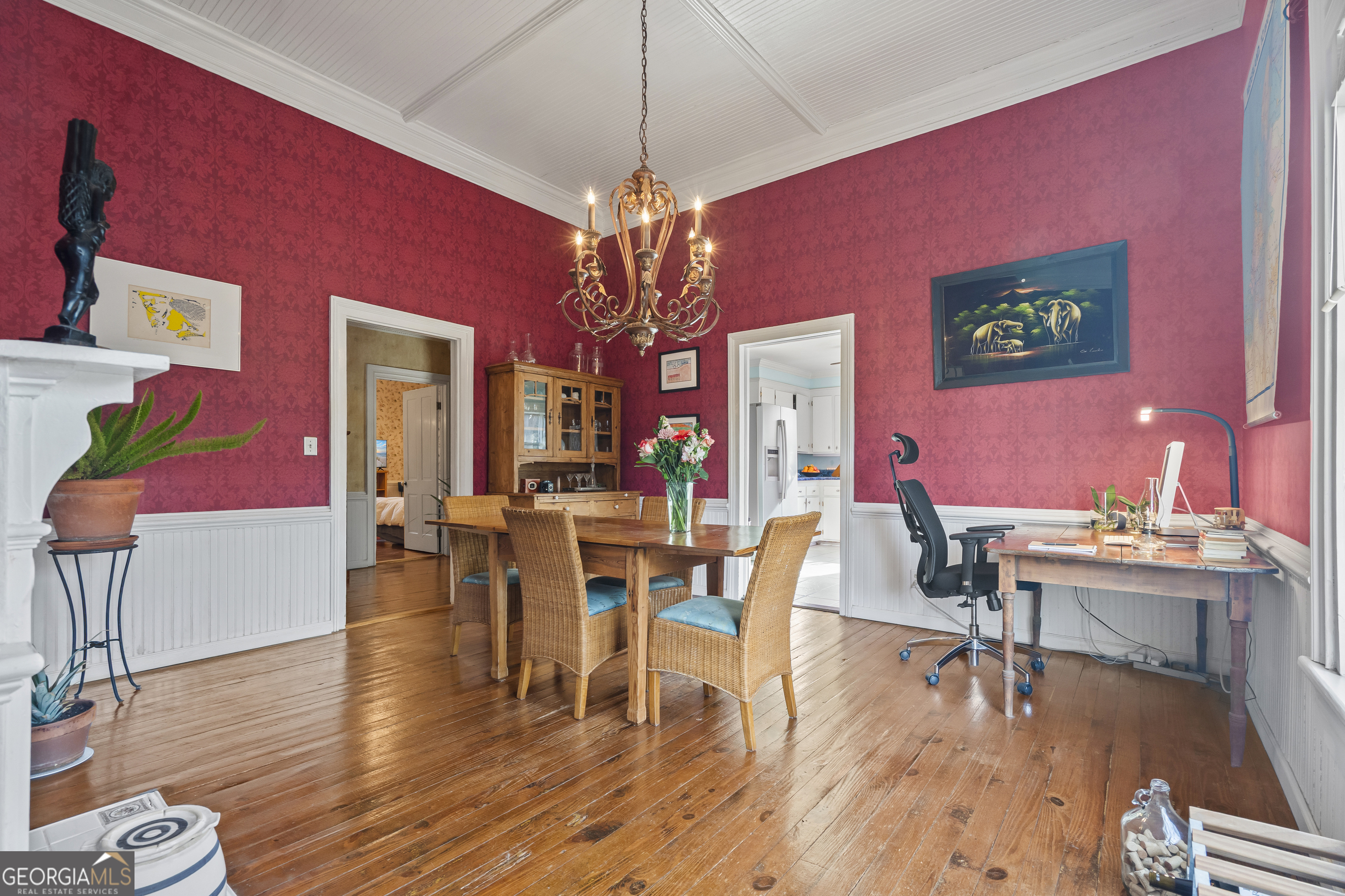48 Georgia Avenue Comer, GA 30629 - Photo 21 of 46 a dining room with furniture a chandelier and wooden floor