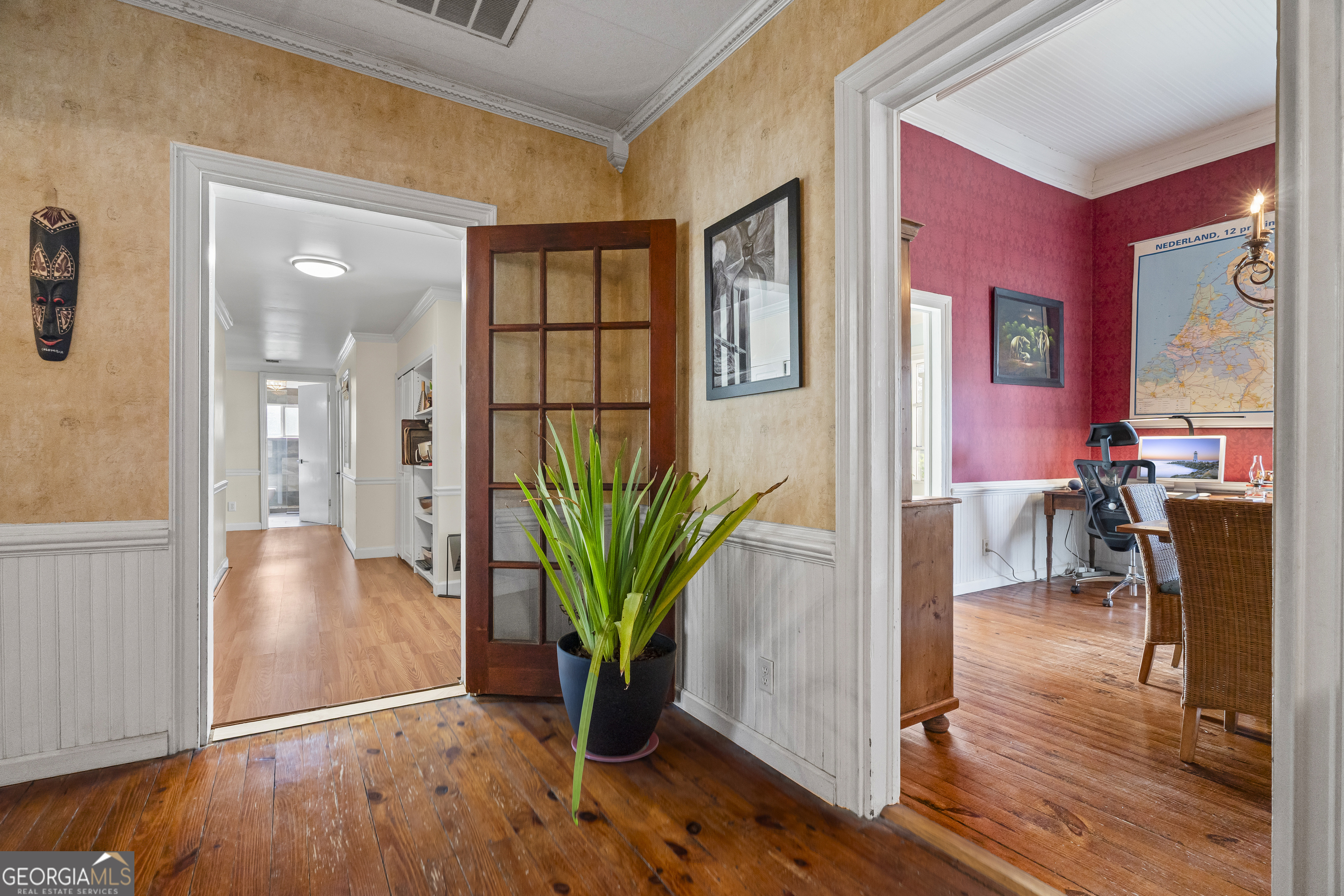48 Georgia Avenue Comer, GA 30629 - Photo 26 of 46 a view of a hallway with wooden floor and a potted plant