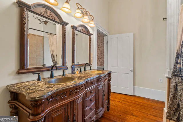 a bedroom with a bed and a fireplace