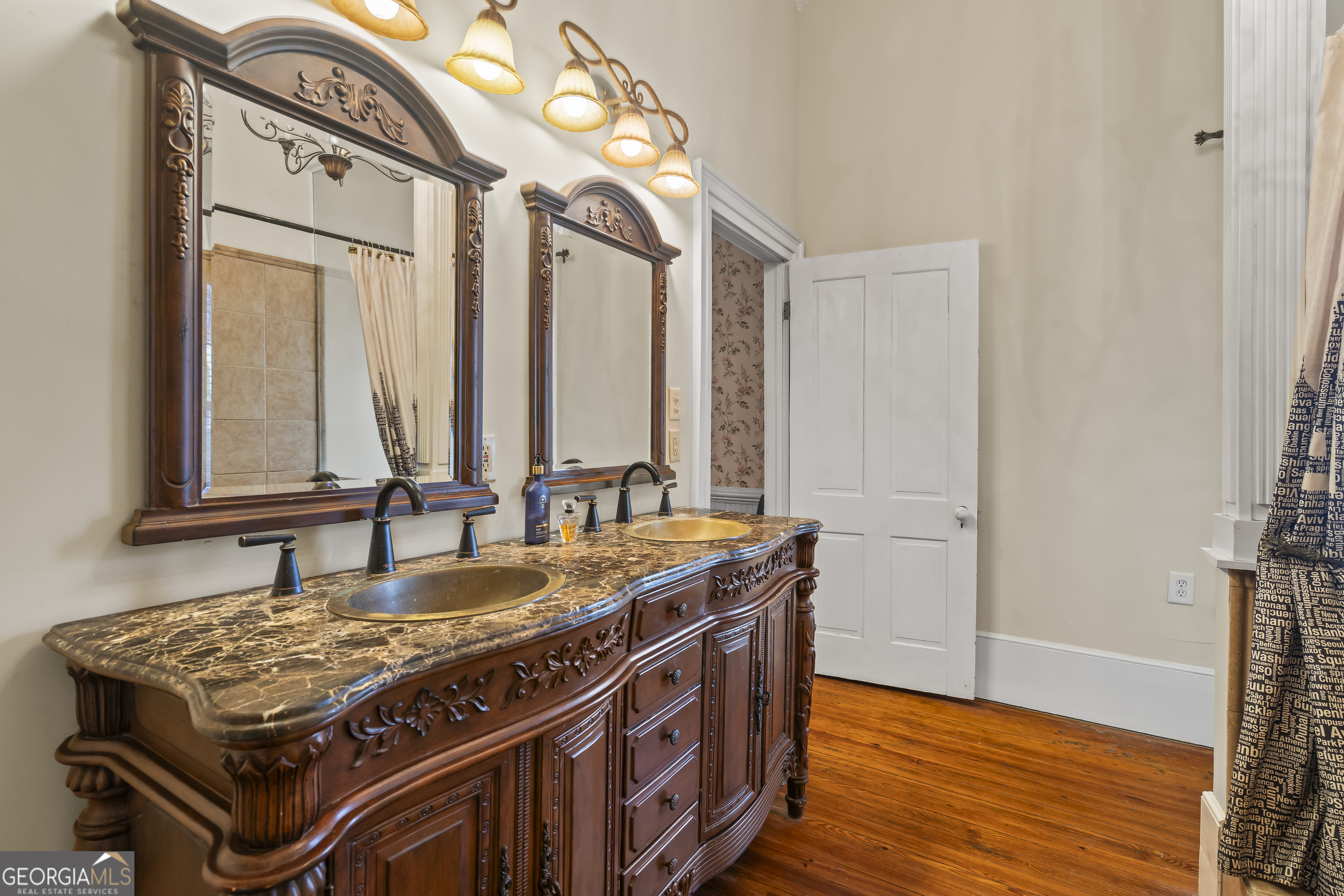 48 Georgia Avenue Comer, GA 30629 - Photo 28 of 46 a kitchen with a stove and a wooden floor