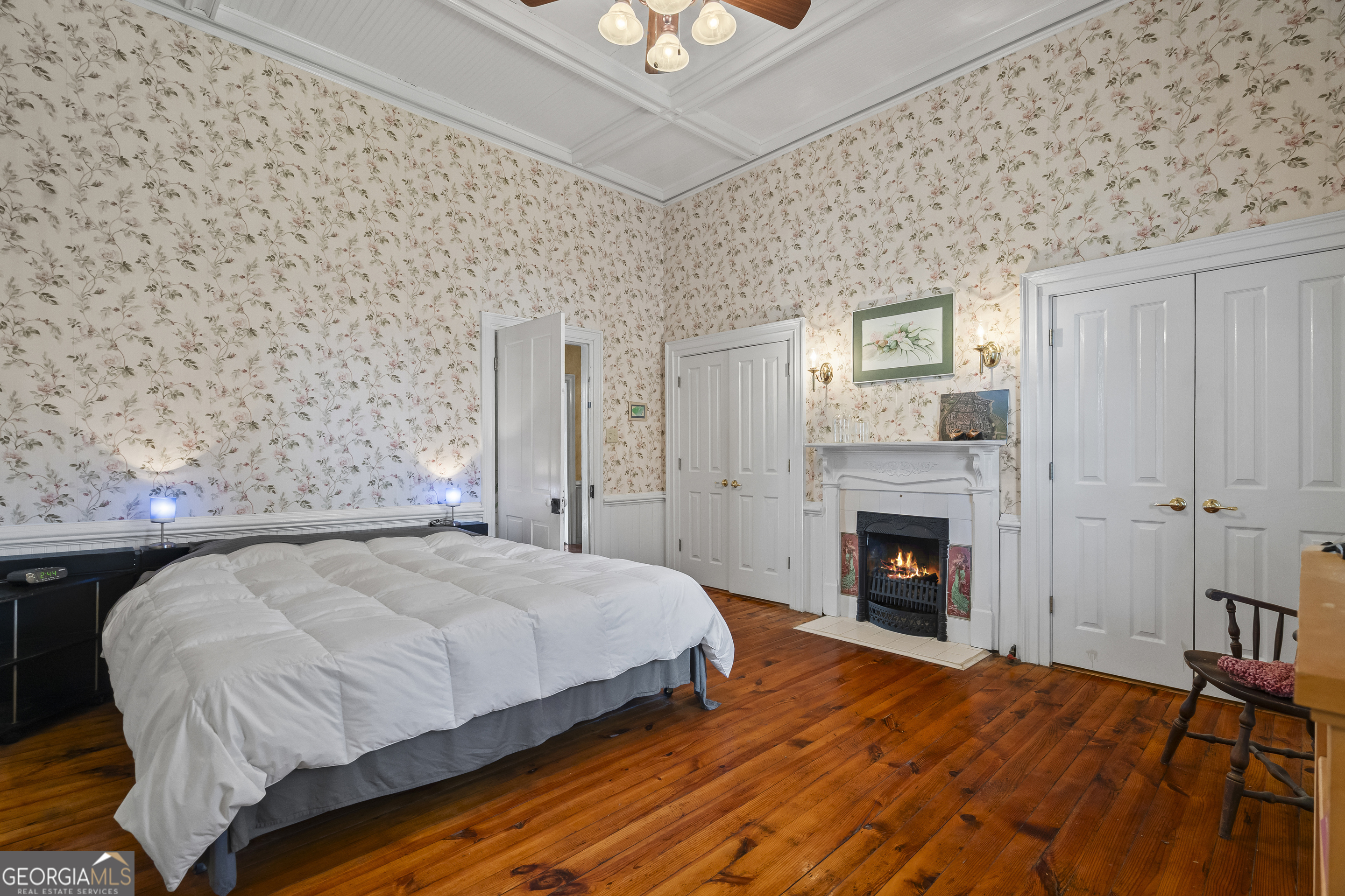 48 Georgia Avenue Comer, GA 30629 - Photo 29 of 46 a bedroom with a bed and a fireplace