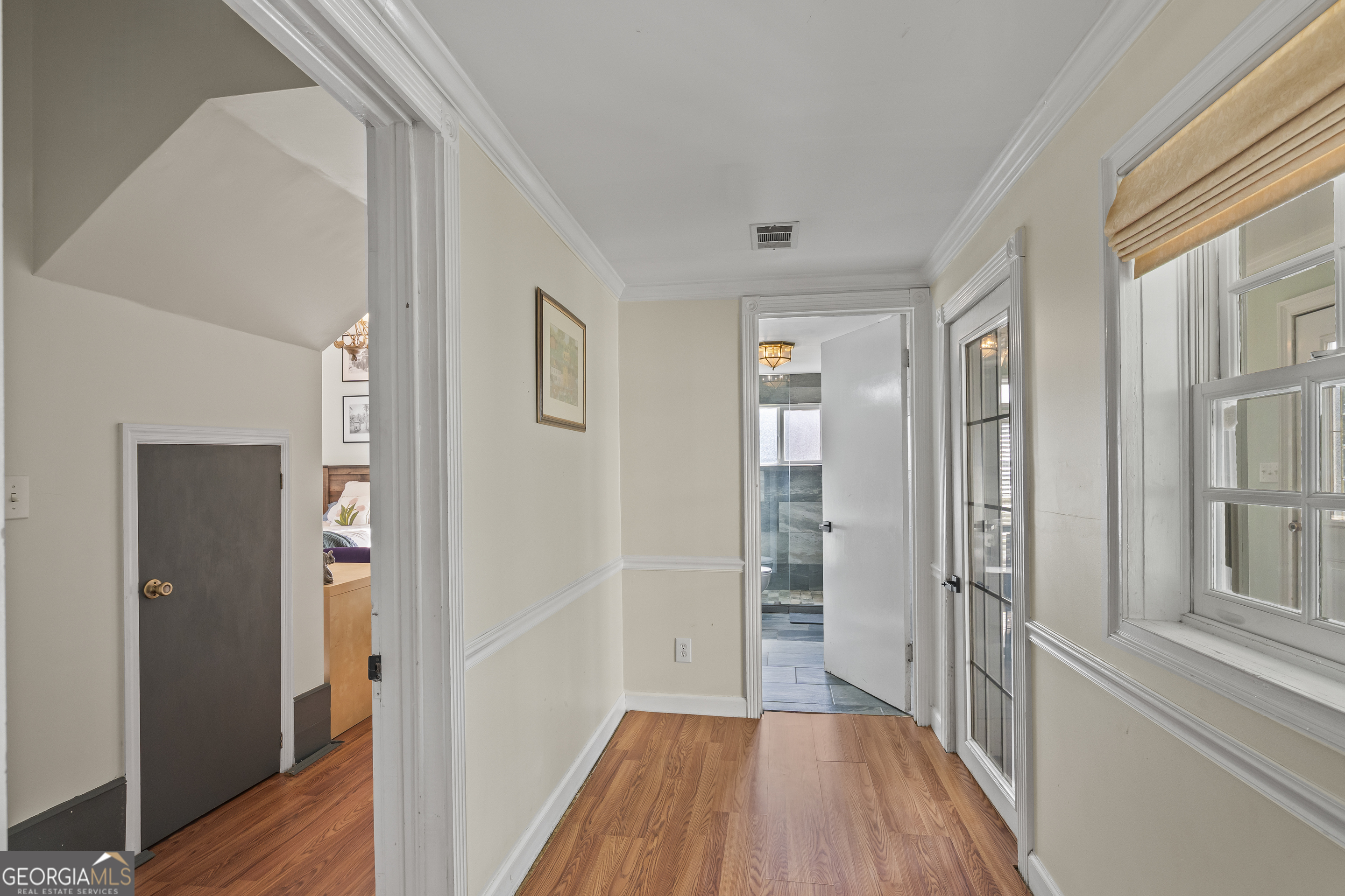 48 Georgia Avenue Comer, GA 30629 - Photo 35 of 46 a view of a hallway with wooden floor and closet