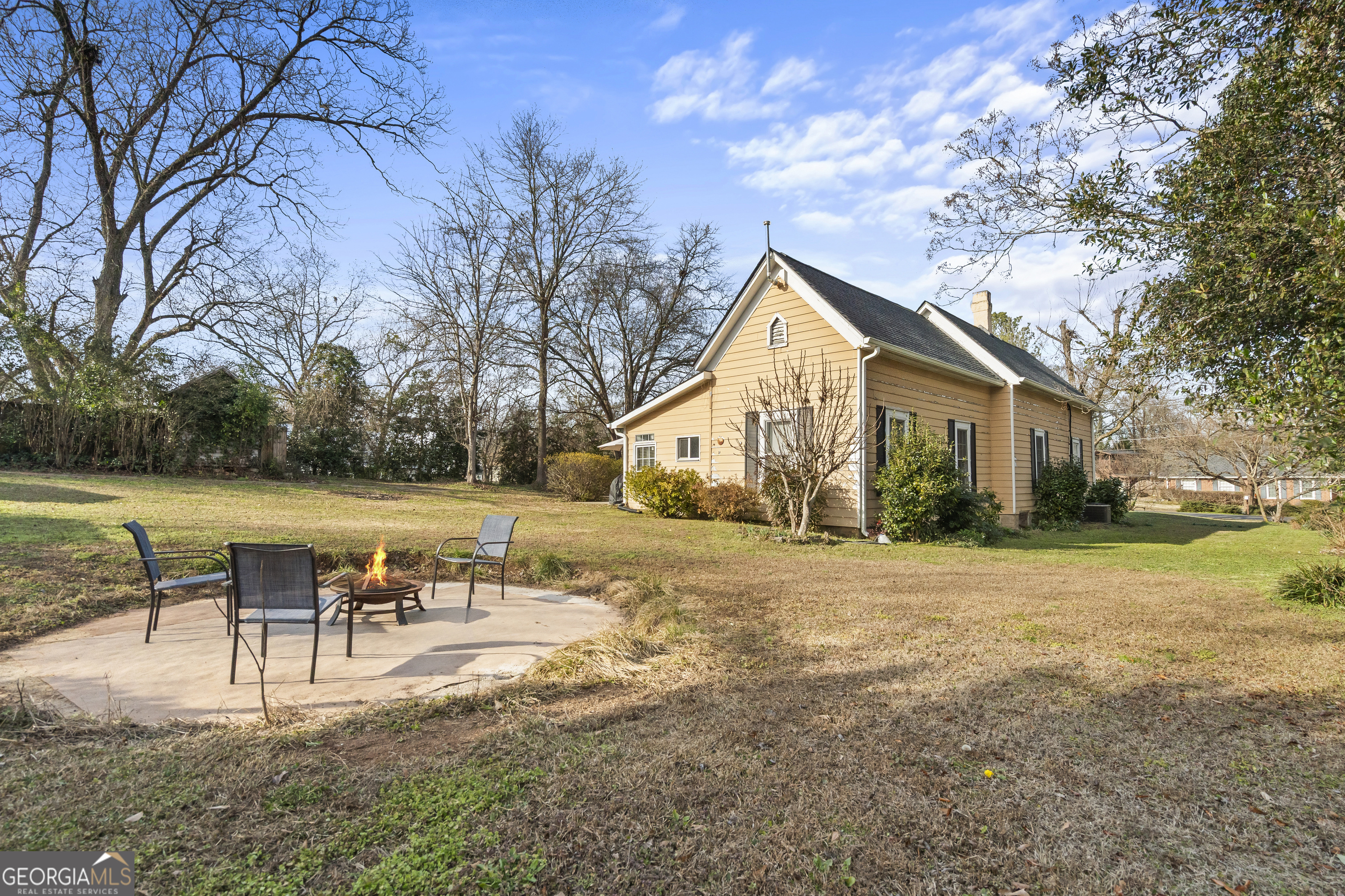 48 Georgia Avenue Comer, GA 30629 - Photo 41 of 46 a view of a house with backyard and a tree