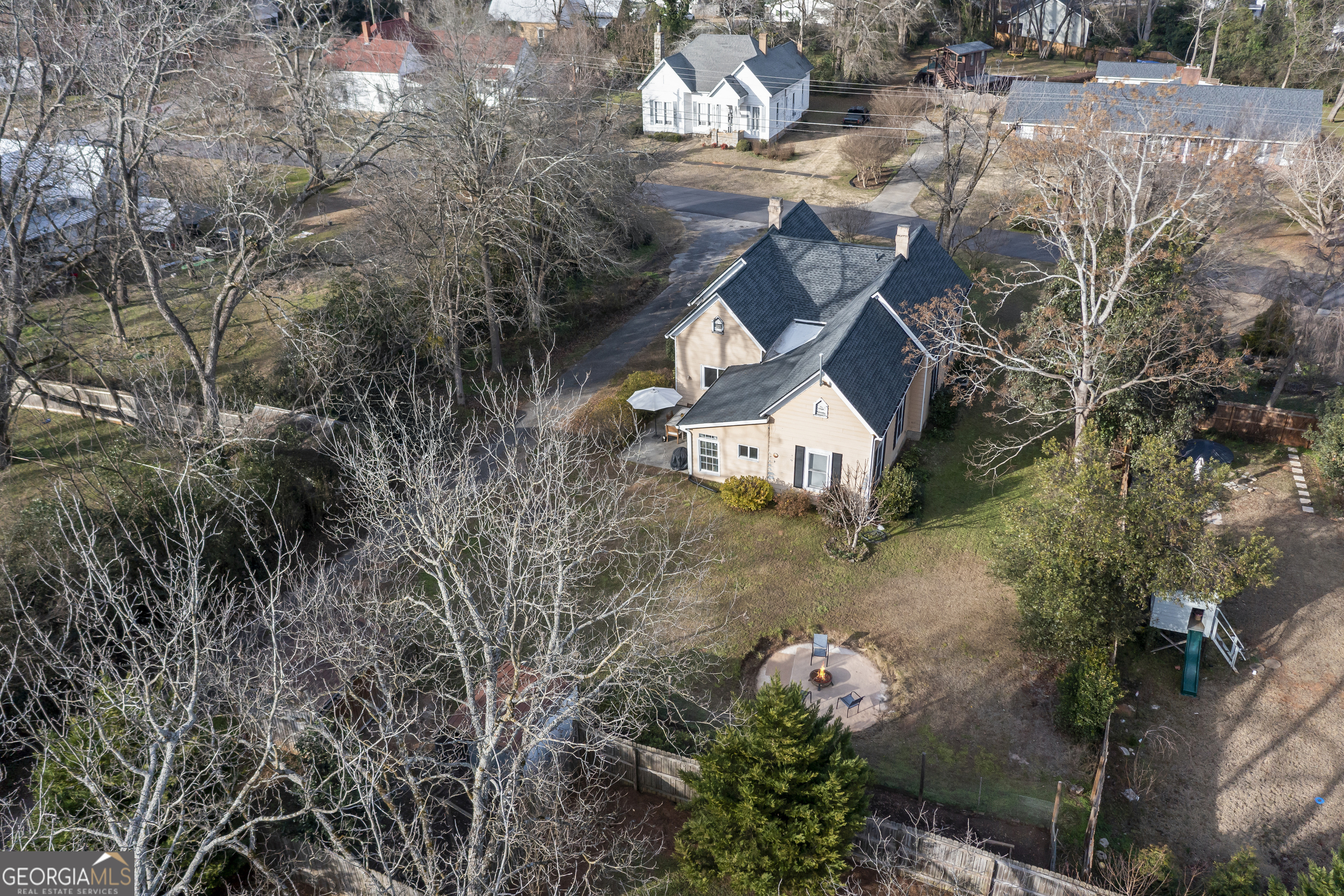 48 Georgia Avenue Comer, GA 30629 - Photo 44 of 46 a house with lots of trees