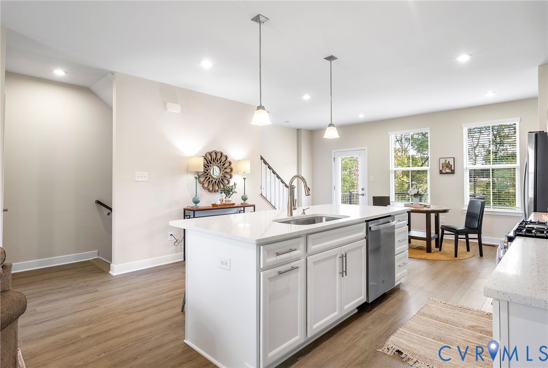 1255 Lazy River Road Midlothian, VA 23114 - Photo 10 of 17 a kitchen with a sink and wooden floor