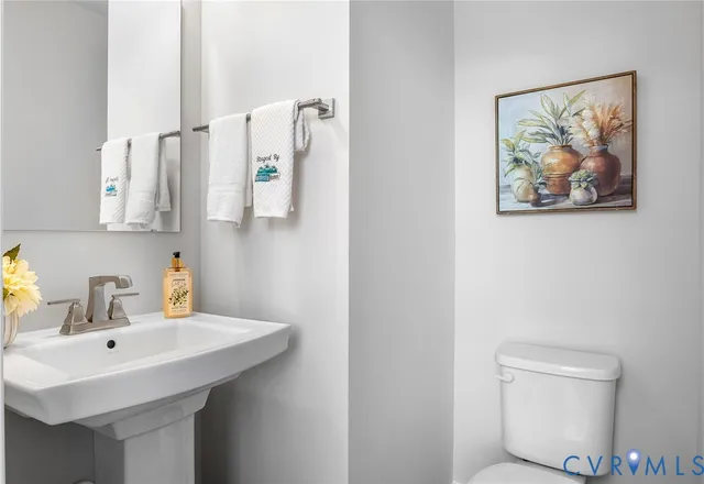a kitchen with a stove and a white cabinets