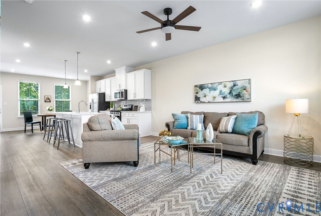 1255 Lazy River Road Midlothian, VA 23114 - Photo 5 of 17 a living room with furniture and a view of kitchen