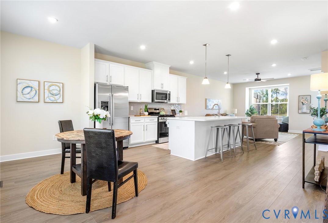 1255 Lazy River Road Midlothian, VA 23114 - Photo 16 of 17 a living room with furniture and kitchen view