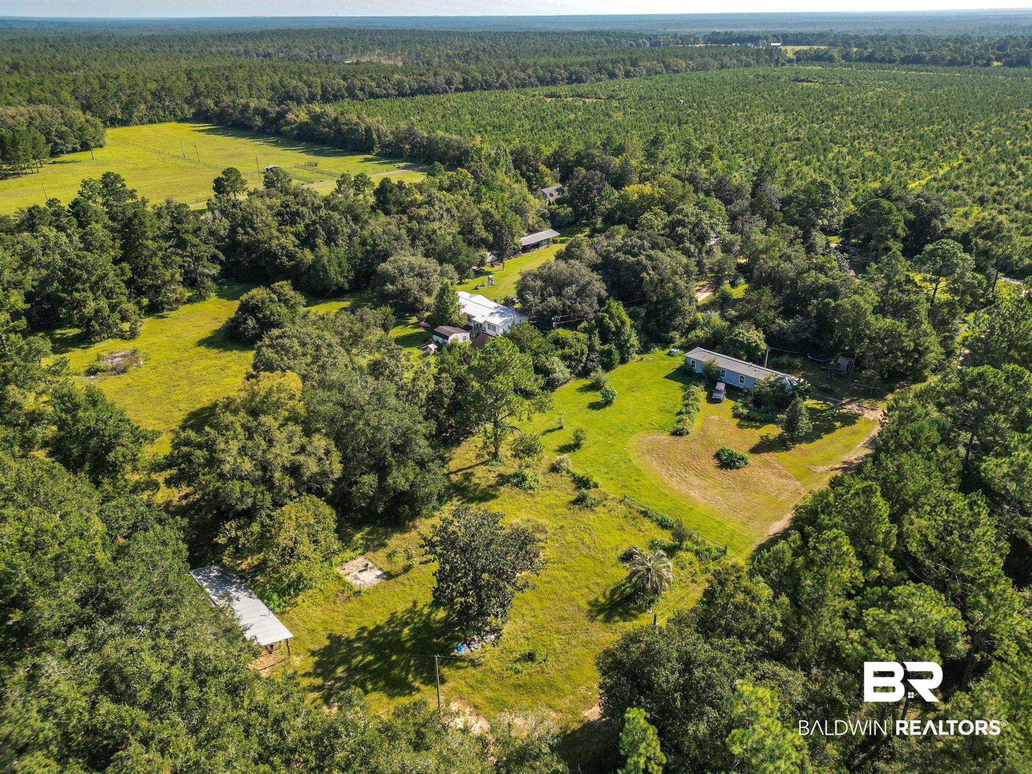 32465 Jay Kee Lane Elberta, AL 36530 - Photo 9 of 17 Aerial view of a heavily wooded area
