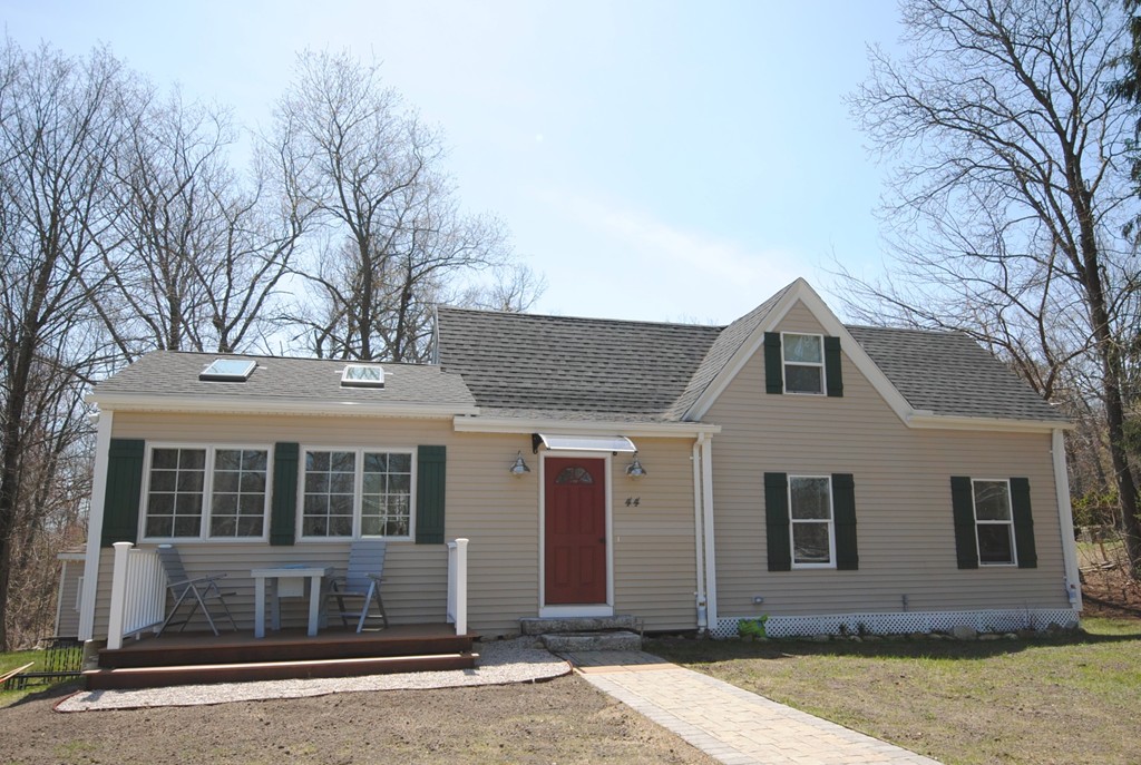 44 Marble Road Sutton, MA 01590 - Photo 1 of 30 a front view of a house with a yard