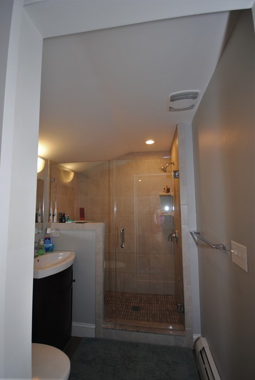 44 Marble Road Sutton, MA 01590 - Photo 11 of 30 a bathroom with a sink and a mirror