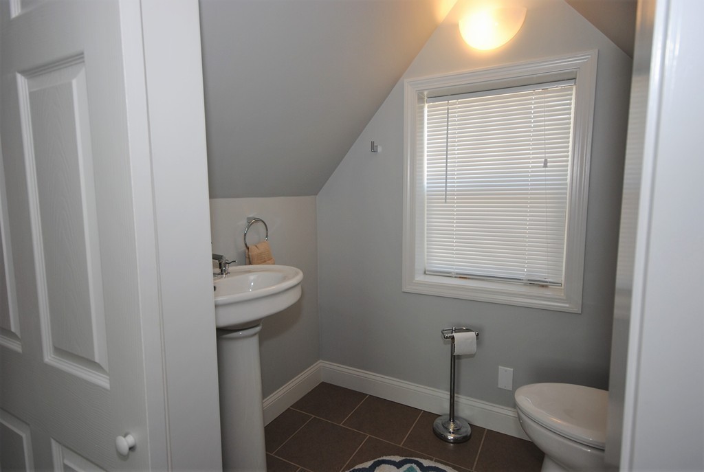 44 Marble Road Sutton, MA 01590 - Photo 16 of 30 a bathroom with a toilet a sink and mirror