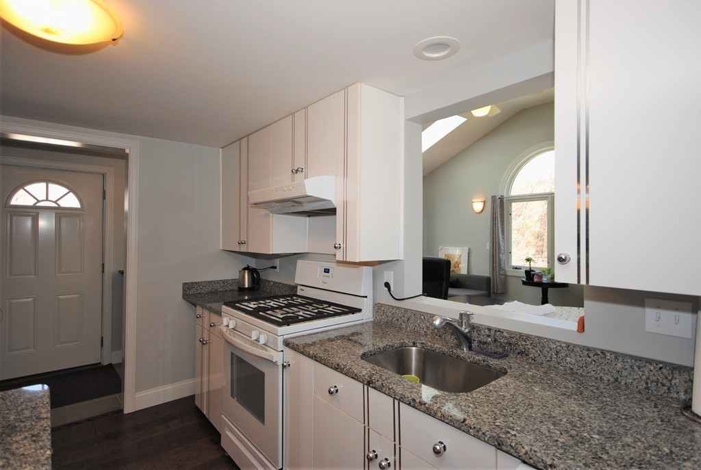 44 Marble Road Sutton, MA 01590 - Photo 7 of 30 a kitchen that has a sink and a stove