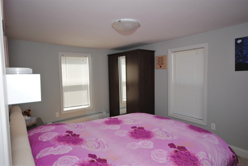 44 Marble Road Sutton, MA 01590 - Photo 9 of 30 a bedroom with a bed and a window