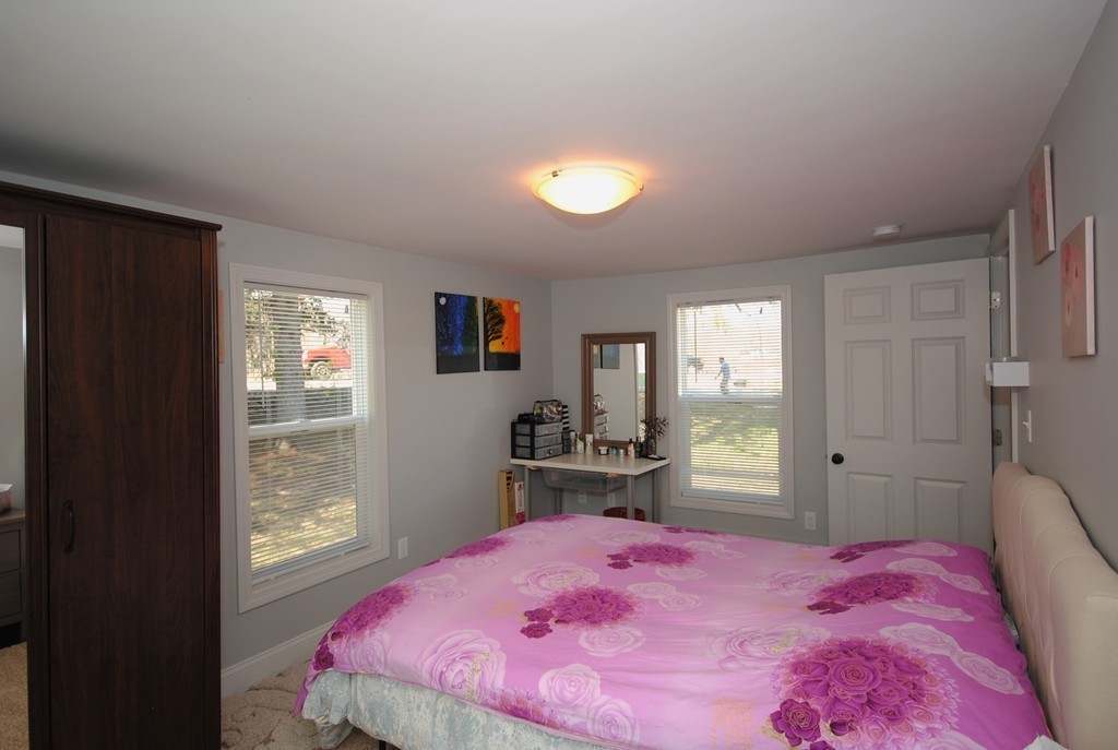 44 Marble Road Sutton, MA 01590 - Photo 10 of 30 a bed room with a bed and a window