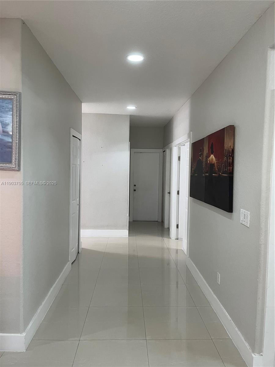 16801 Southwest 38th Street Miramar, FL 33027 - Photo 24 of 63 a view of a hallway