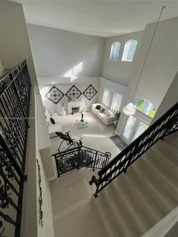 a bath tub sitting in a bathroom next to a bathroom sink
