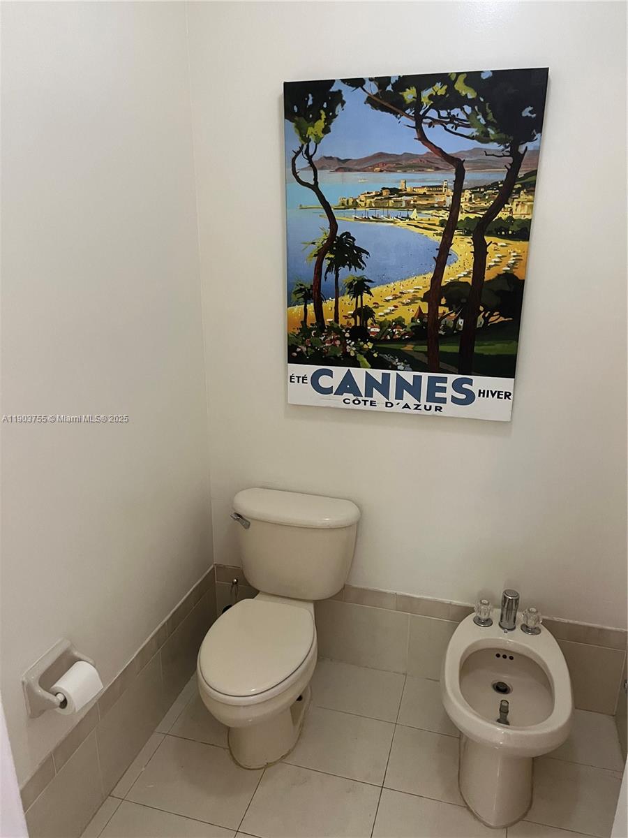 16801 Southwest 38th Street Miramar, FL 33027 - Photo 50 of 63 a bathroom with a toilet and a sink