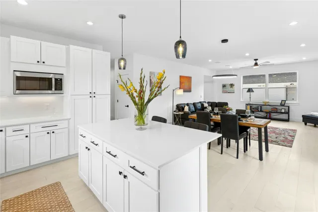 a front view of a house with garage