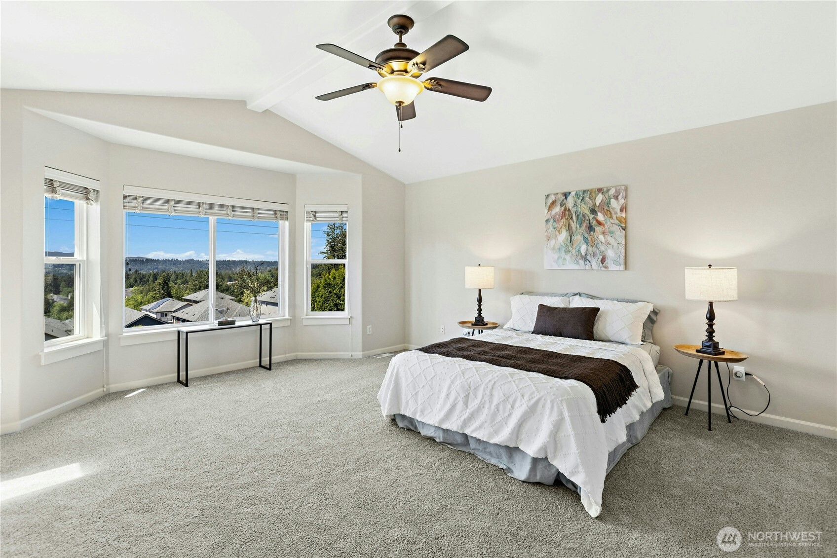 22624 43rd Drive Southeast Bothell, WA 98021 - Photo 16 of 36 a spacious bedroom with a bed and a large window