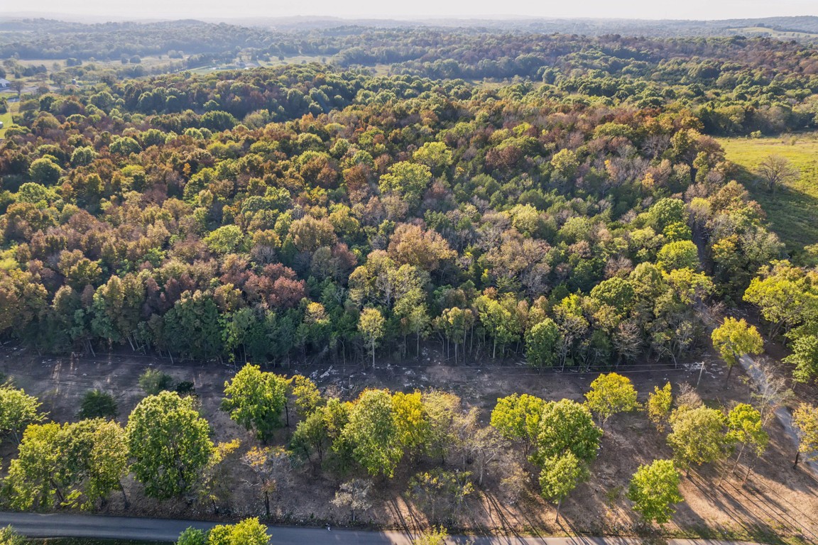 3 Atkinson Road Lebanon, TN 37090 - Photo 5 of 16 an aerial view of a house with a yard and lake view