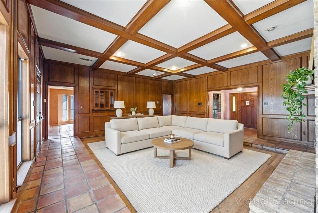 241 Simmons Road Double Oak, TX 75077 - Photo 9 of 40 Living room with wooden walls and coffered ceiling