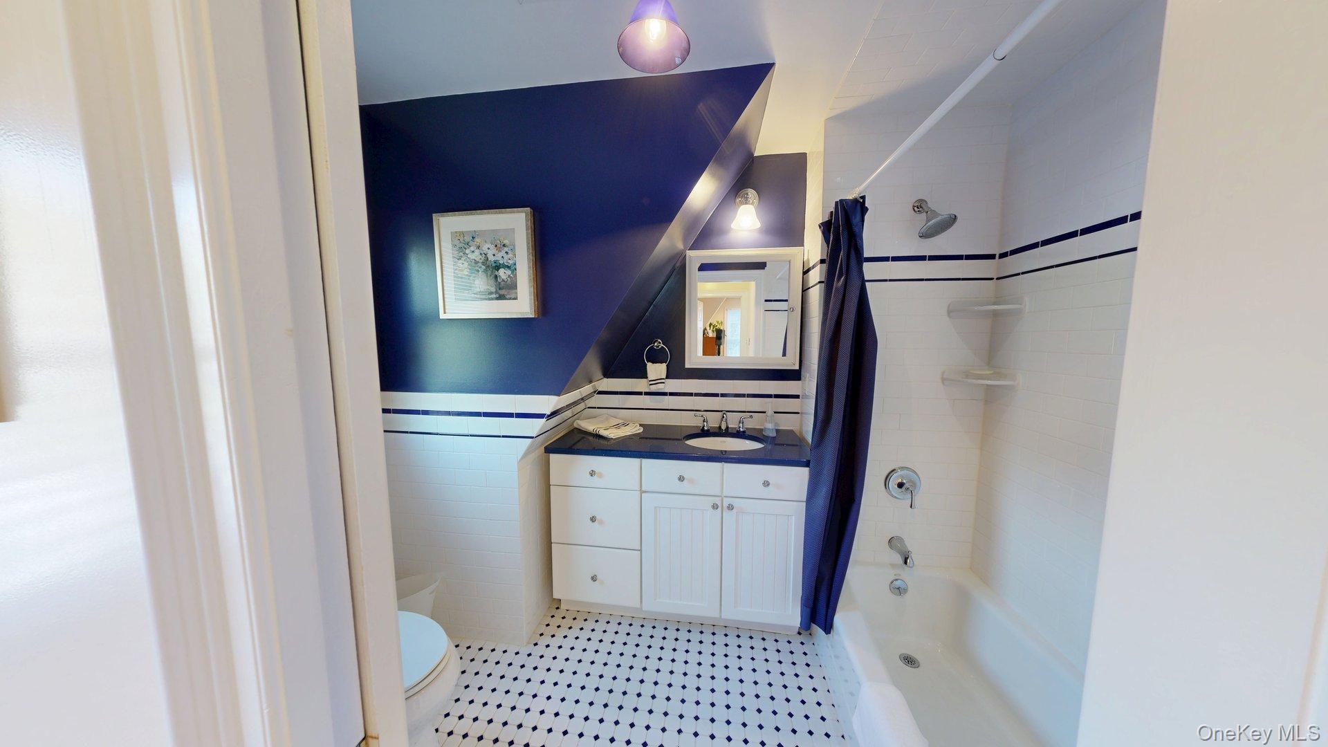 15 Woodbine Road Irvington, NY 10533 - Photo 14 of 20 a kitchen with granite countertop a refrigerator and a sink