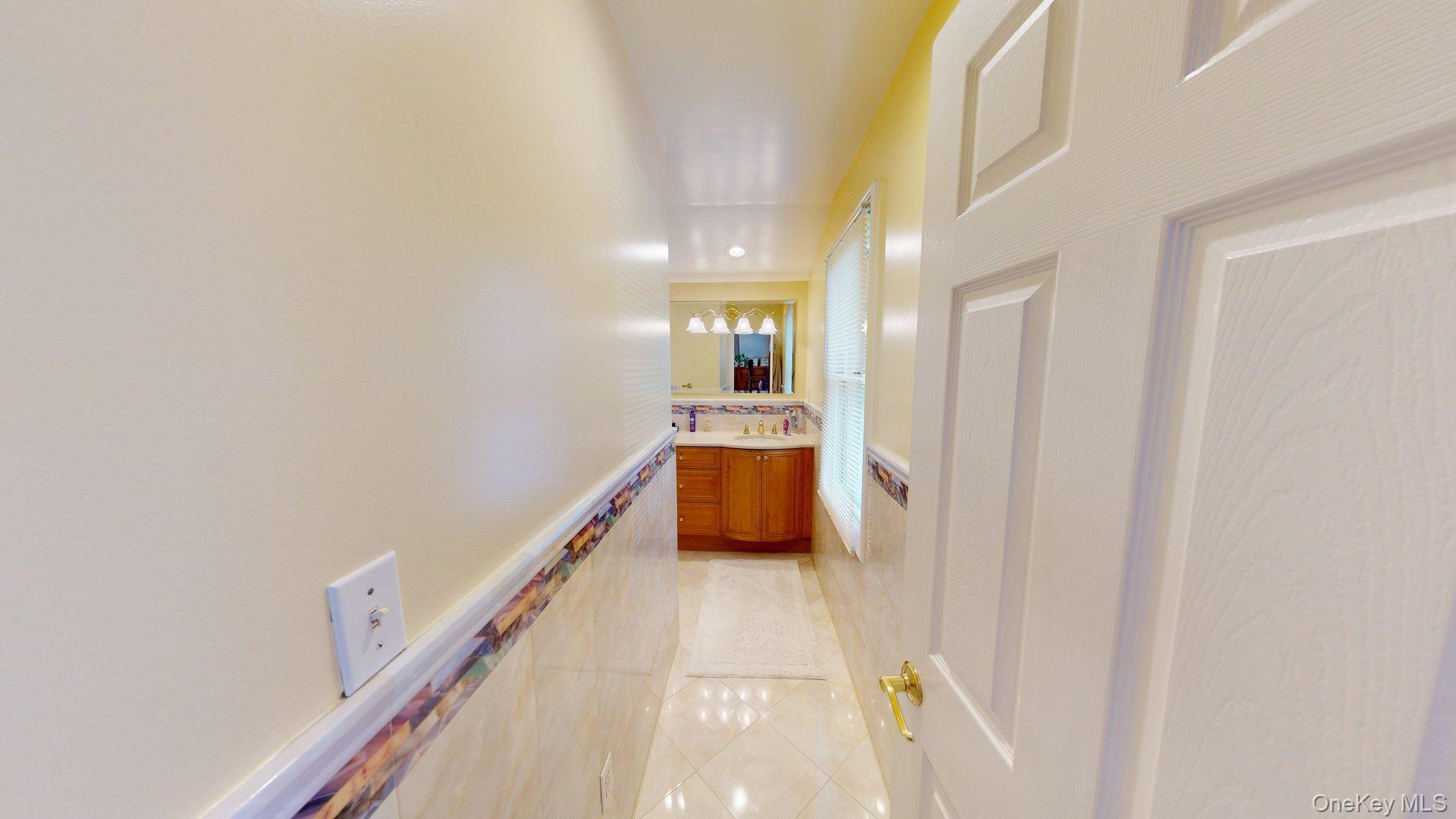 15 Woodbine Road Irvington, NY 10533 - Photo 17 of 20 a view of a hallway with front door
