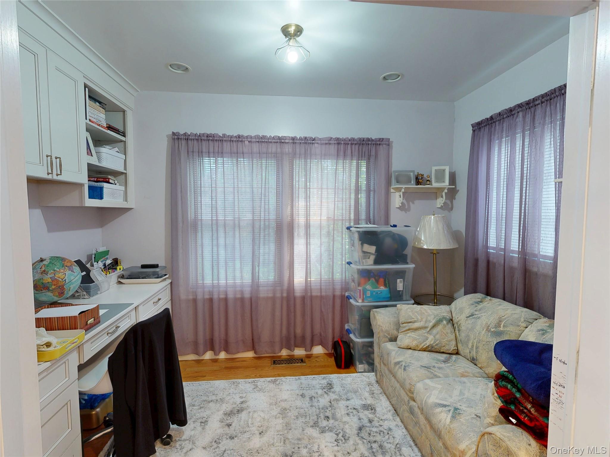 15 Woodbine Road Irvington, NY 10533 - Photo 4 of 20 a living room with furniture and a window
