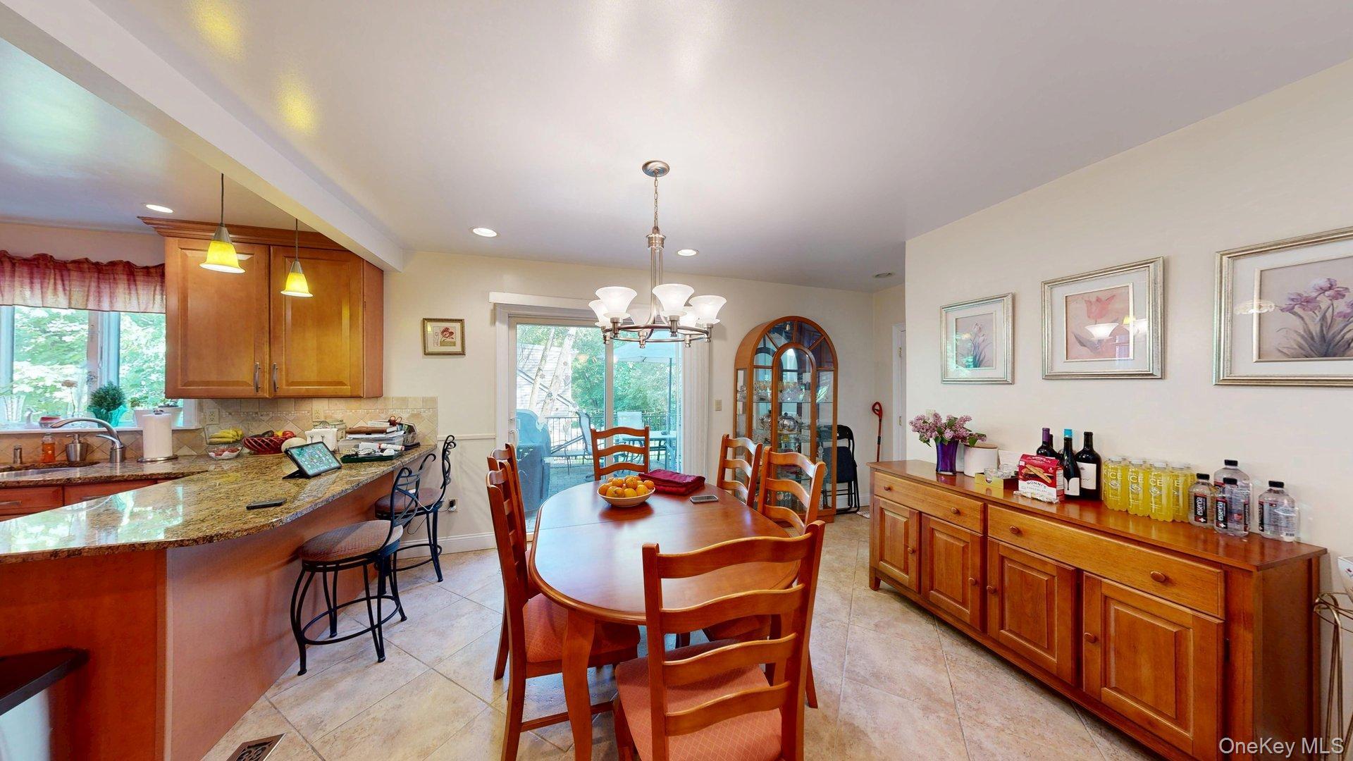 15 Woodbine Road Irvington, NY 10533 - Photo 8 of 20 a group of people sitting in a living room