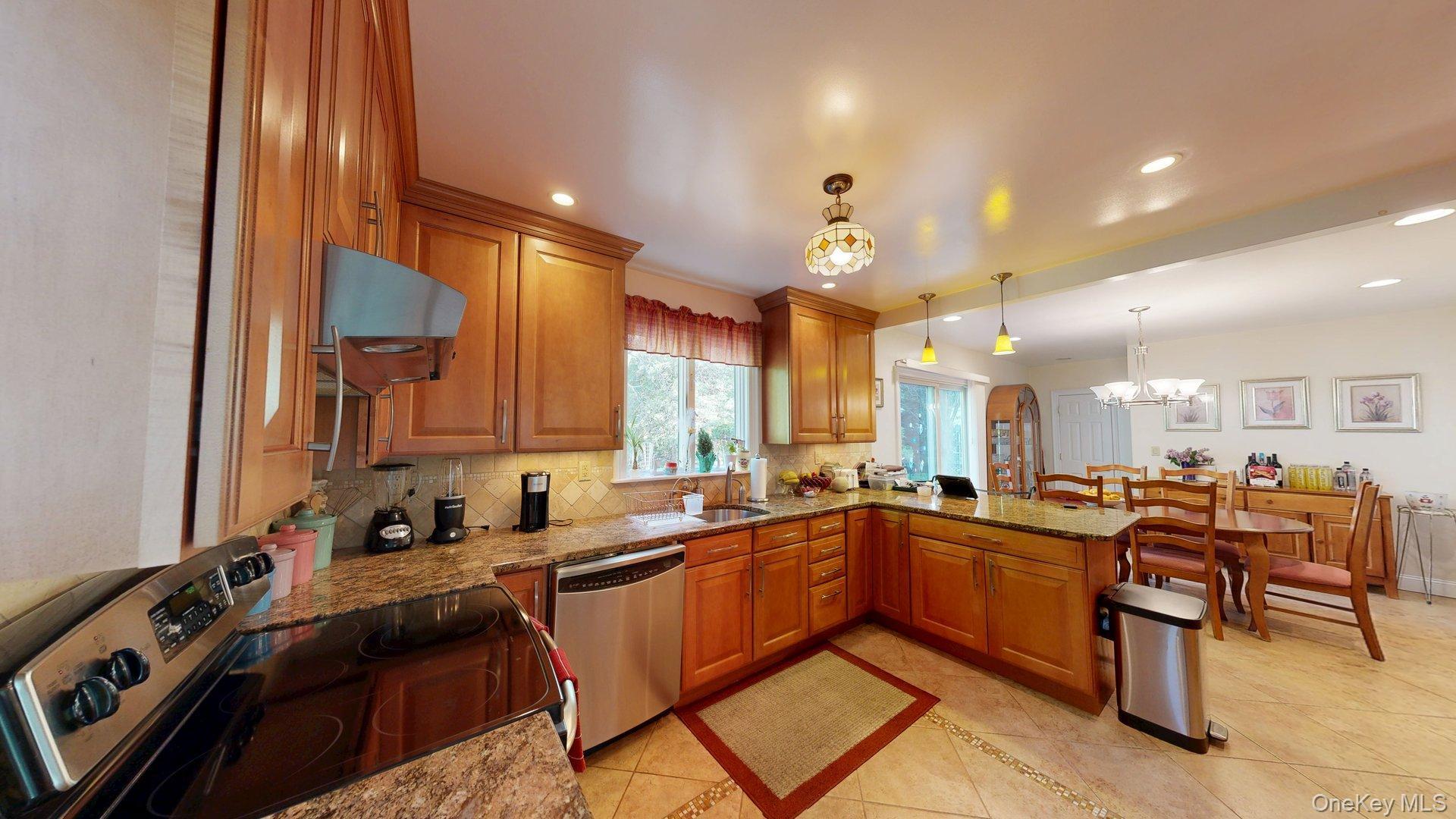 15 Woodbine Road Irvington, NY 10533 - Photo 10 of 20 a kitchen with lots of counter top space