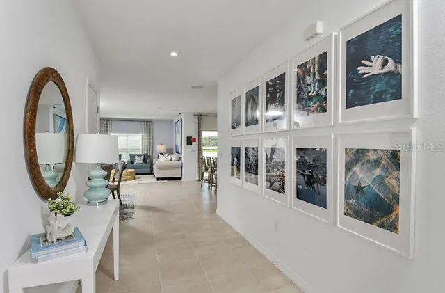 a kitchen with cabinets a sink and a refrigerator