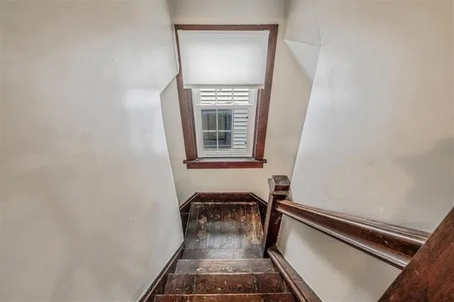a view of a room with staircase
