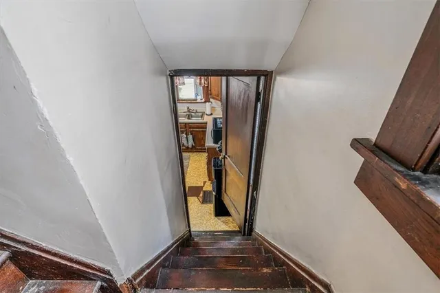 a living room with furniture flat screen tv and a fireplace