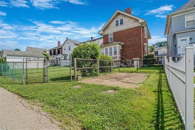 a view of a house with a big yard