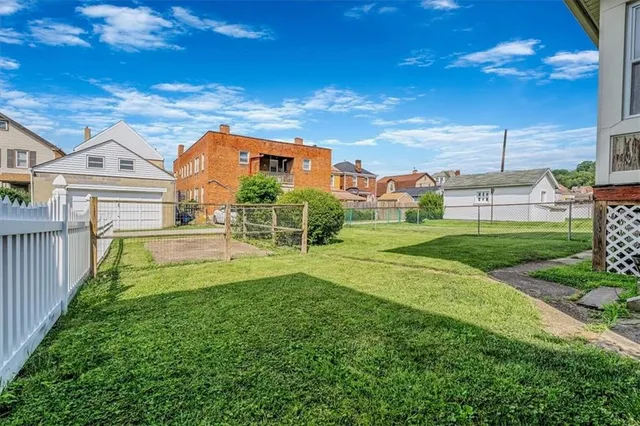 a picture of a bench in front of a wall