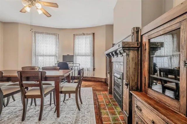 a dining room with furniture and window