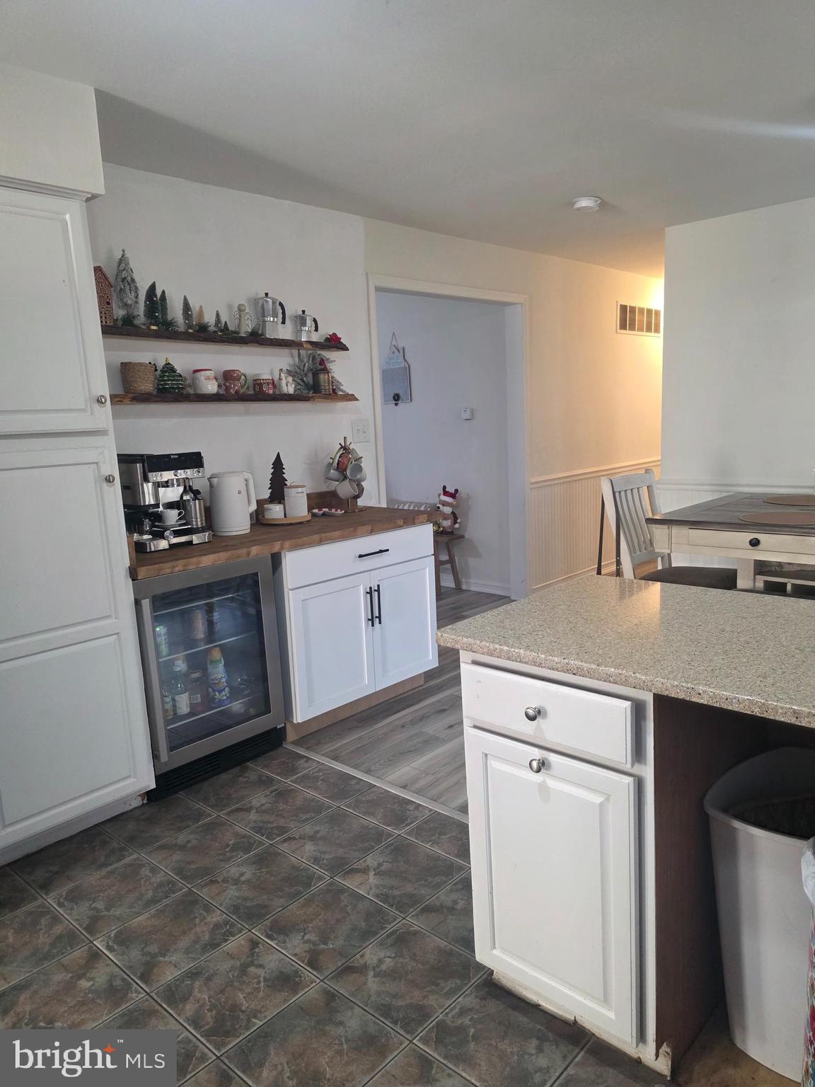 537 Centerton Road Pittsgrove, NJ 08318 - Photo 18 of 28 a kitchen with white cabinets and sink