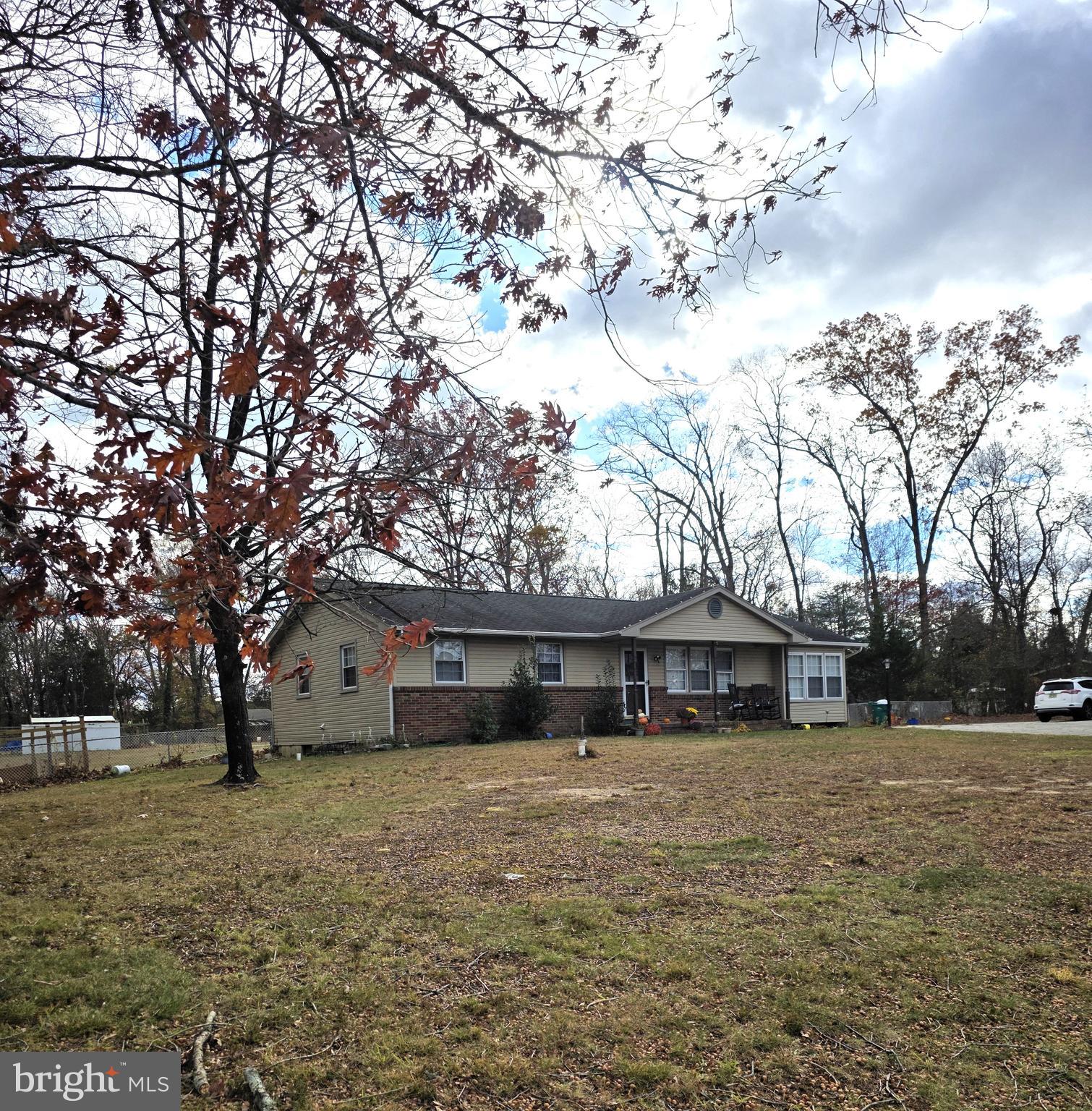 537 Centerton Road Pittsgrove, NJ 08318 - Photo 2 of 28 a front view of a house with a yard