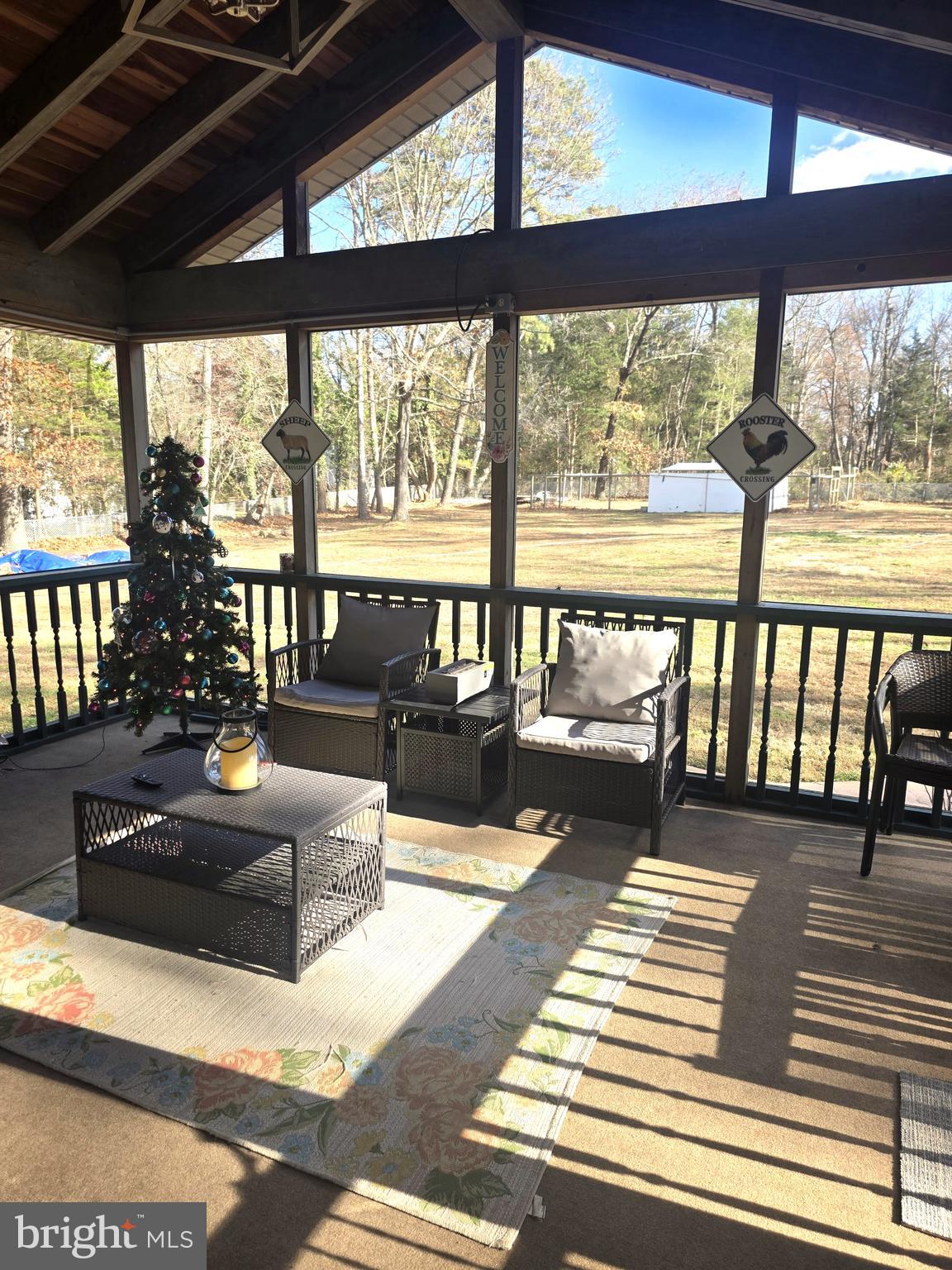 537 Centerton Road Pittsgrove, NJ 08318 - Photo 22 of 28 a living room with large windows and furniture