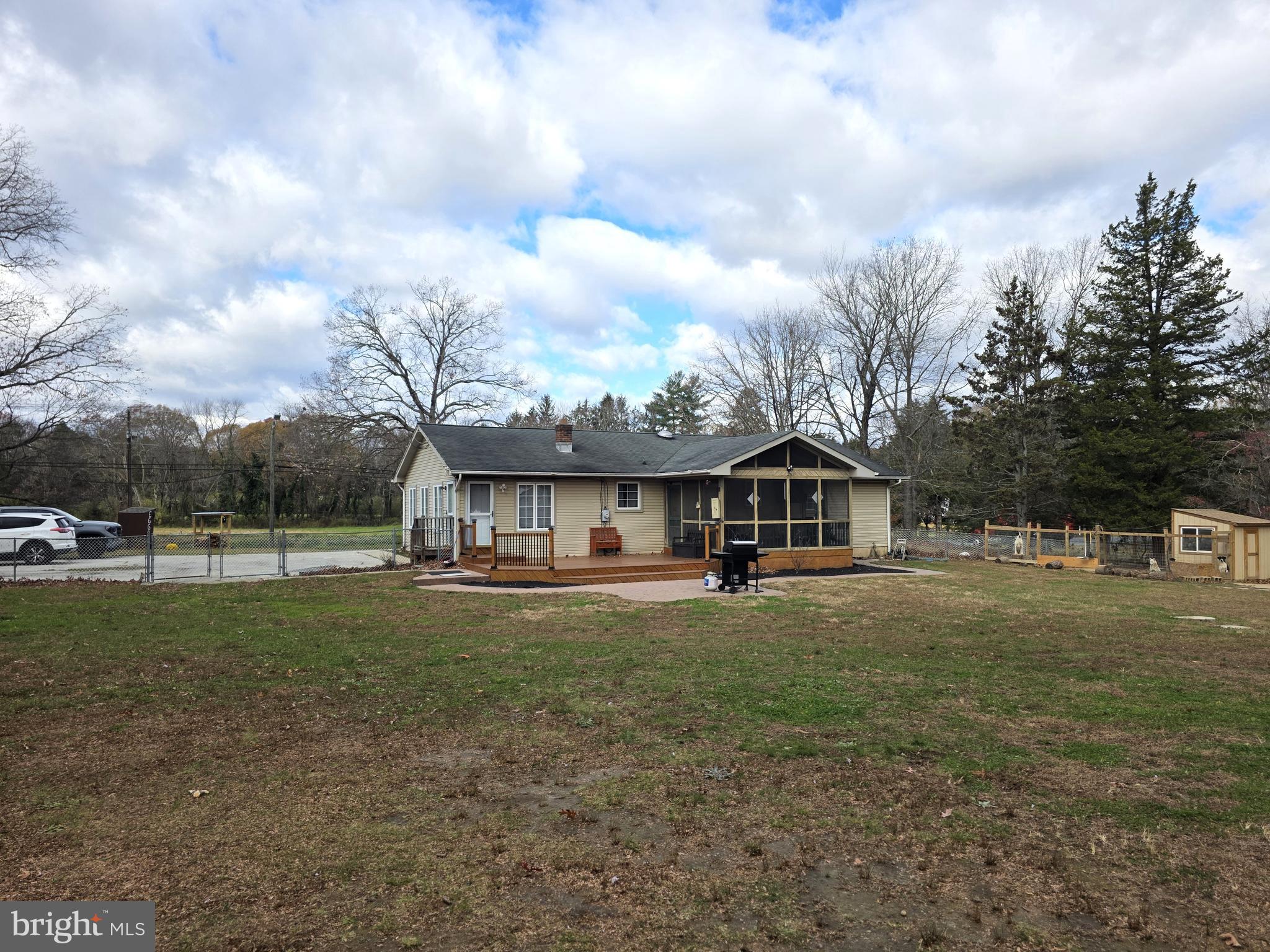 537 Centerton Road Pittsgrove, NJ 08318 - Photo 24 of 28 a view of a big house with a big yard and large trees