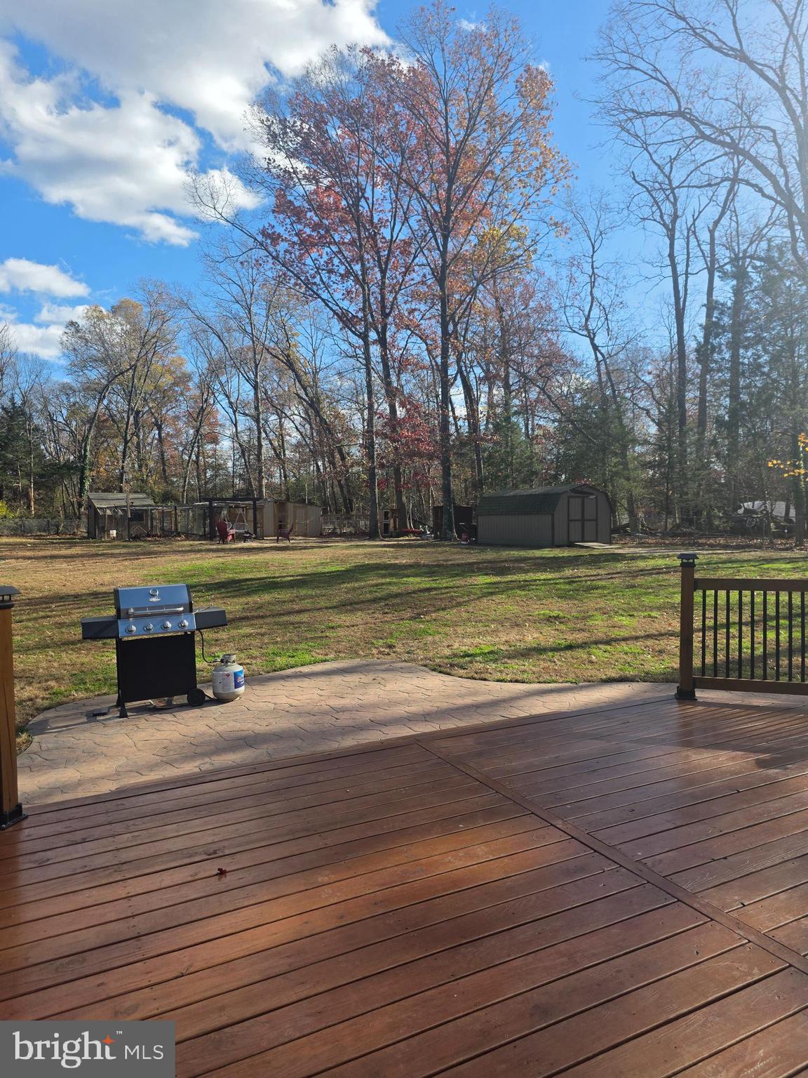537 Centerton Road Pittsgrove, NJ 08318 - Photo 25 of 28 a view of a swimming pool with deck and a yard