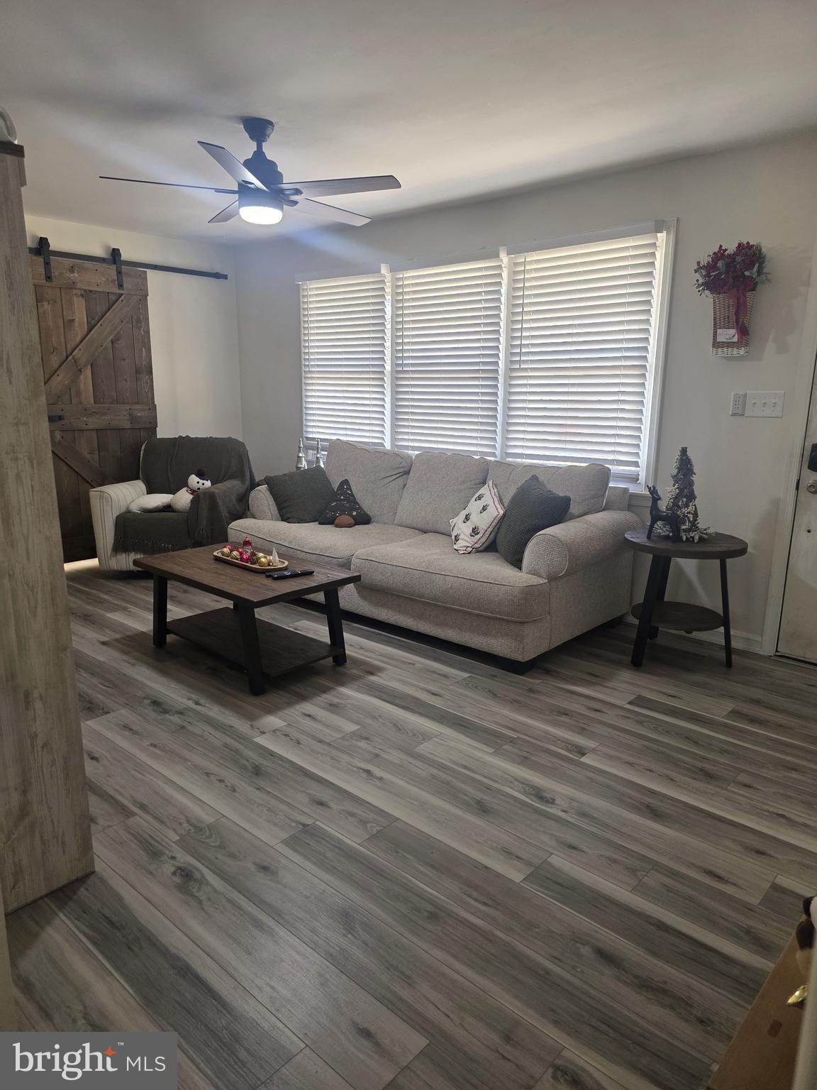 537 Centerton Road Pittsgrove, NJ 08318 - Photo 3 of 28 a living room with furniture and a large window